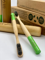 Load image into Gallery viewer, Eco Garden Celadon Green Bamboo Travel Toothbrush
